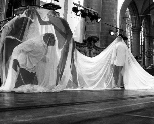 Dance by a theater group, displaying emotional movement.