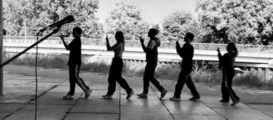 Dance by a theater group, displaying emotional movement.